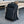 Vollansicht des Slim Pack Rucksack von SPARTANHUB stehend vor einem Tisch – minimalistisches, elegantes Design für Beruf und Alltag.